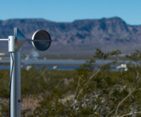 An instrument for remote monitoring and data collection in the foreground of the desert landscape