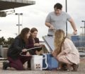 Erica Marti works with UNLV students to assemble a portable solar energy classroom kit